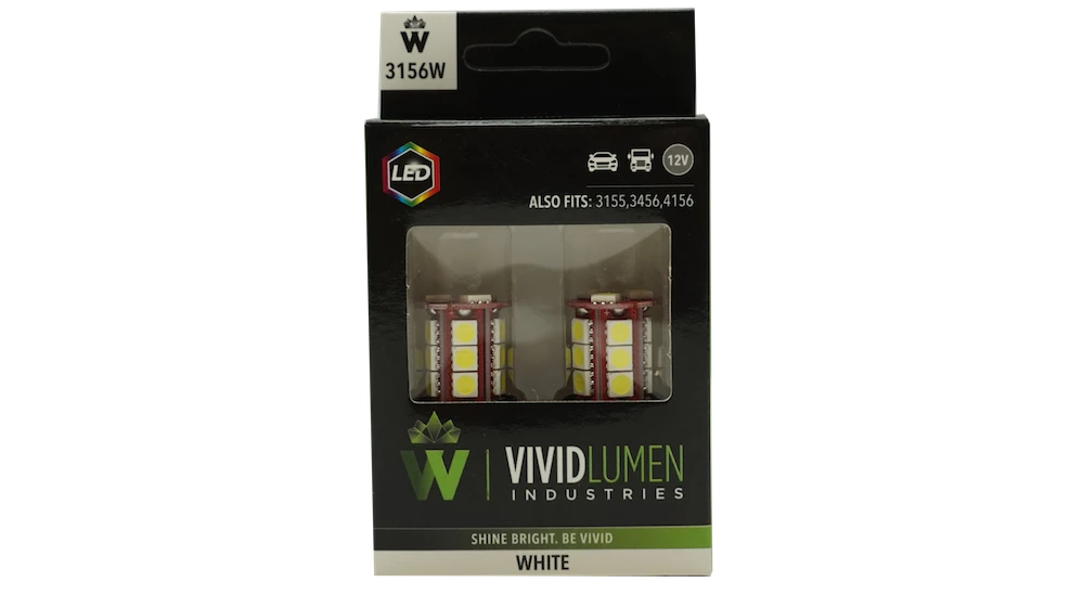 Pair of 3156 White LED Bulbs in Vehicle Headlights, providing enhanced visibility and safety