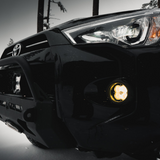 FNG 3 Series Fog Kit For 16-23 Toyota Tacoma, 10-23 4Runner mounted on a Toyota Tacoma, enhancing its appearance and functionality.